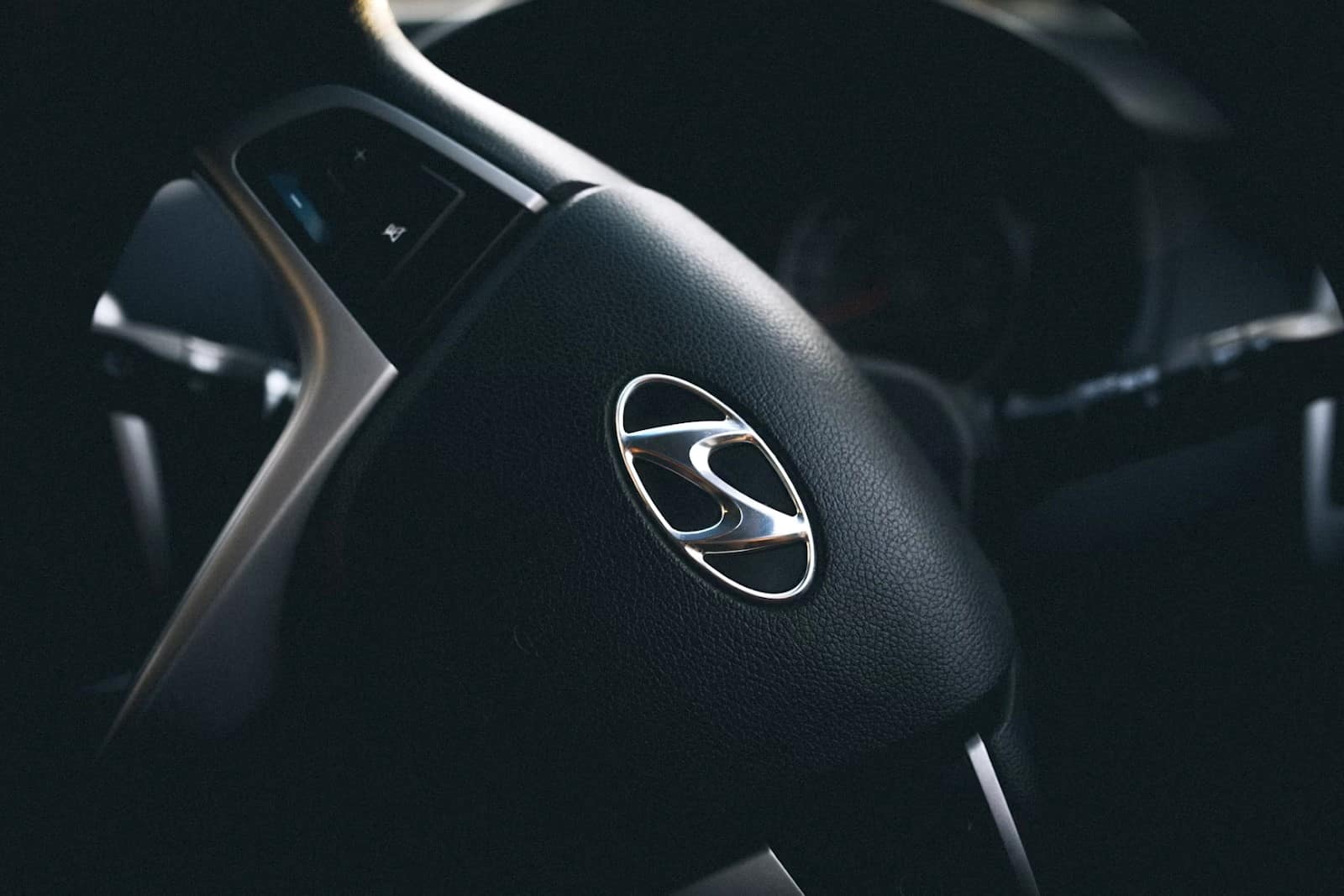 Close-up of a black Hyundai steering wheel